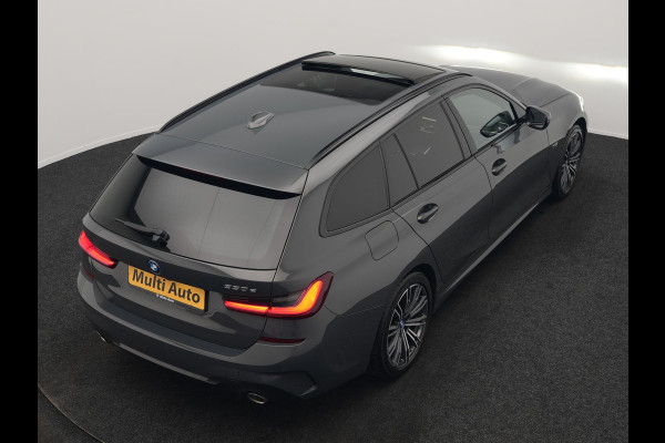 BMW 3 Serie Touring 330e M Sport 293pk Dealer O.H. Dravitgrau | Panodak | Adaptive Cruise | Camera | Lederen Sportstoelen Memory & Verwarmd | Sfeerverlichting | Stuur Verwarmd | Hifi Audio | Blis | Keyless | Apple Carplay | Plug In Hybrid |