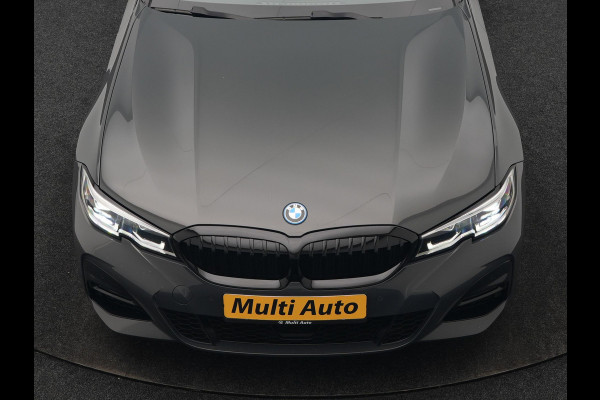 BMW 3 Serie Touring 330e M Sport 293pk Dealer O.H. Dravitgrau | Panodak | Adaptive Cruise | Camera | Lederen Sportstoelen Memory & Verwarmd | Sfeerverlichting | Stuur Verwarmd | Hifi Audio | Blis | Keyless | Apple Carplay | Plug In Hybrid |