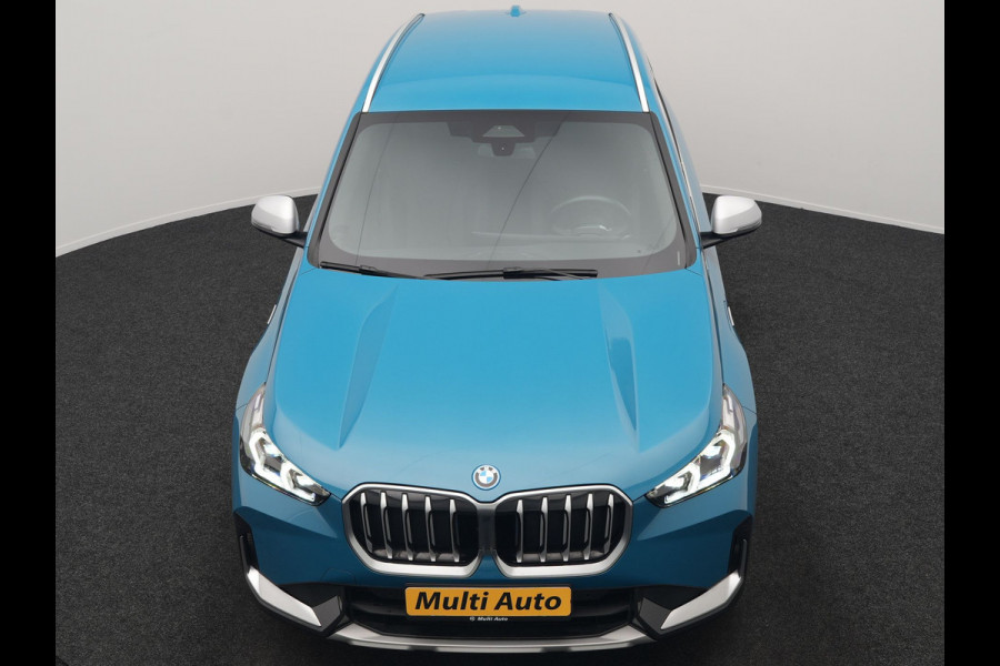 BMW X1 xDrive30e X Line PHEV 327pk Dealer O.H. | Camera | Lederen Sportstoelen & Stuur Verwarmd | Sfeerverlichting | Apple Carplay | Blis | Keyless | Navigatie | DAB | Cruise Control | 20"L.M | Plug In Hybrid |