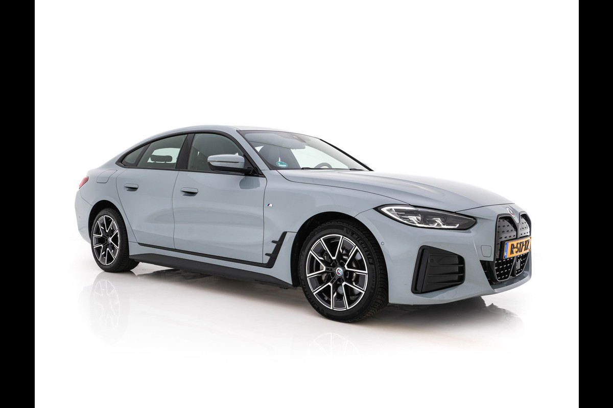 BMW i4 eDrive40 84 kWh M-Sport *M50 JAHRE* [ 3-Fase-11 kW ] {SOH-96%} (INCL-BTW) *LEATHER-ALCANTARA | FULL-LED | ADAPTIVE-CRUISE | HEATED-SPORTSEATS | CAMERA | DAB | DIGI-COCKPIT | NAVI-FULLMAP | AMBIENT-LIGHT | ECC | PDC | CARPLAY | KEYLESS | SHIFTPADDLES | 18