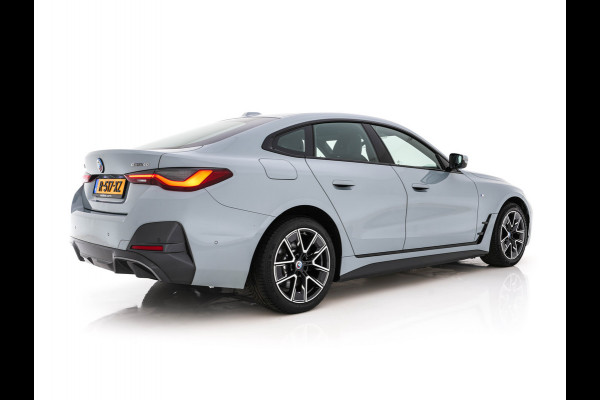 BMW i4 eDrive40 84 kWh M-Sport *M50 JAHRE* [ 3-Fase-11 kW ] {SOH-96%} (INCL-BTW) *LEATHER-ALCANTARA | FULL-LED | ADAPTIVE-CRUISE | HEATED-SPORTSEATS | CAMERA | DAB | DIGI-COCKPIT | NAVI-FULLMAP | AMBIENT-LIGHT | ECC | PDC | CARPLAY | KEYLESS | SHIFTPADDLES | 18