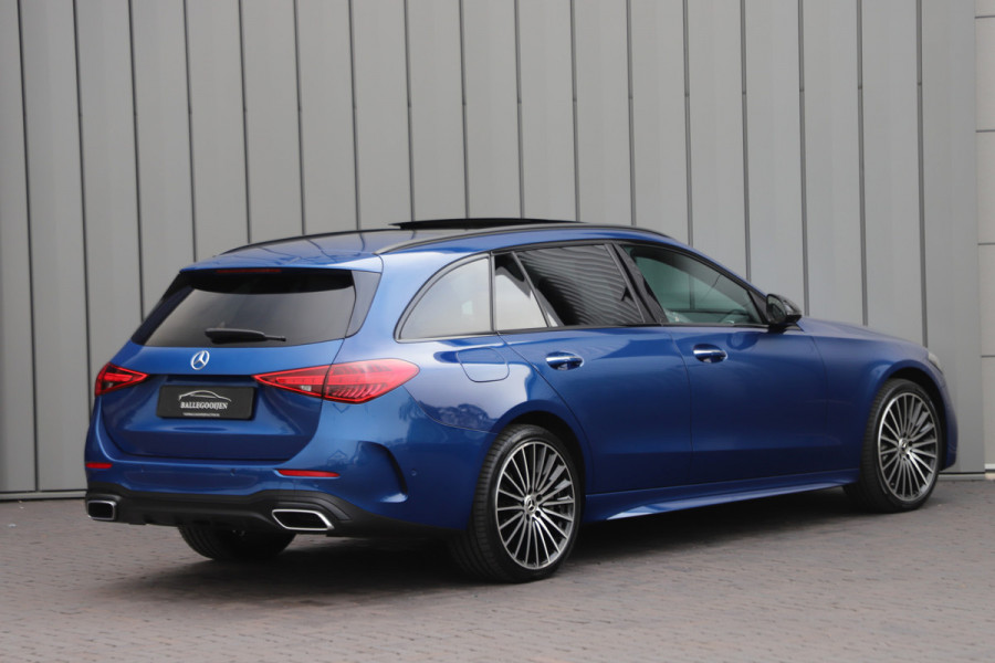 Mercedes-Benz C-Klasse Estate 300e AMG | 313PK | Massage | Head-up | Keyless | Sfeerverlichting | Stoelkoeling | Distronic+ | Leder | 2022.