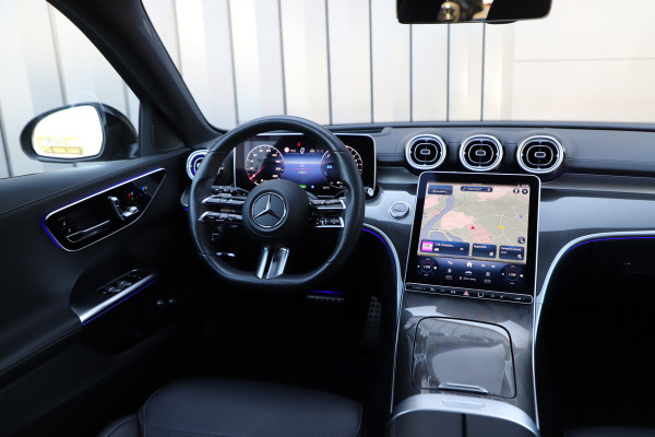 Mercedes-Benz C-Klasse Estate 300e AMG | 313PK | Massage | Head-up | Keyless | Sfeerverlichting | Stoelkoeling | Distronic+ | Leder | 2022.