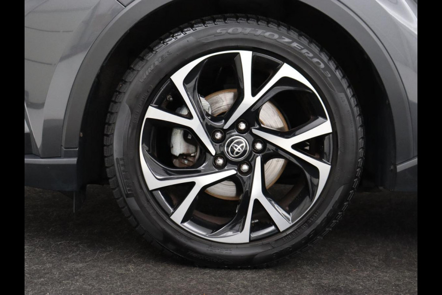 Toyota C-HR 2.0 Hybrid First Edition | Stoelverwarming | Adaptive cruise | Camera | Carplay | JBL Sound | Keyless | Full LED | Navigatie | Dodehoek detectie | Climate control | Bluetooth