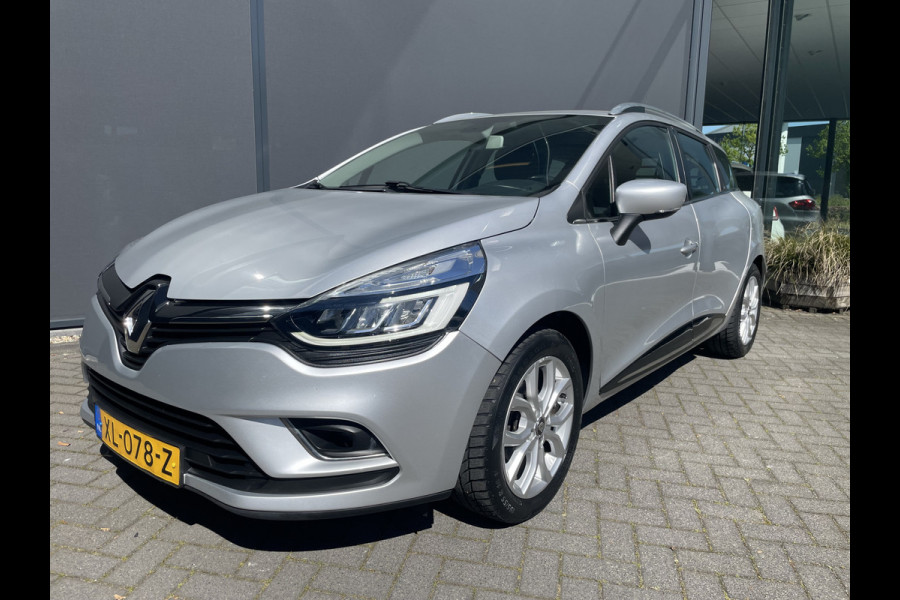 Renault Clio Estate 0.9 TCe Intens Airco - Achteruitrijcamera - Parkeersensor achter - Navigatie - Cruise control - Dakrails - Licht metalen velgen 16 inch - Led verlichting - Elektrische ramen - Keyless entry/ start - Bluetooth - Stuur multifunctioneel - Stuur leder - Radio