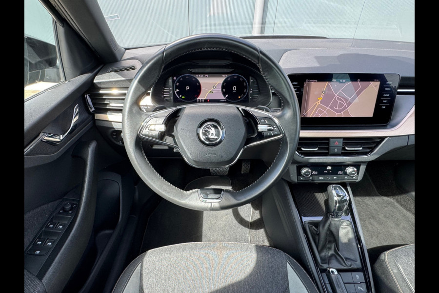 Škoda Kamiq 1.0 TSI Style * Glazen dak * Stoelverwarming * Camera * Climate controle *