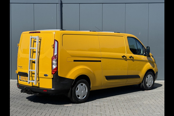 Ford Transit Custom 2.0 TDCI / L2H1 / 1e EIG. / AIRCO / CRUISE / 2.8 TONS TREKHAAK / STOELVERW / PDC / DAKDRAGERS