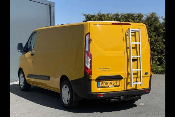 Ford Transit Custom 2.0 TDCI / L2H1 / 1e EIG. / AIRCO / CRUISE / 2.8 TONS TREKHAAK / STOELVERW / PDC / DAKDRAGERS