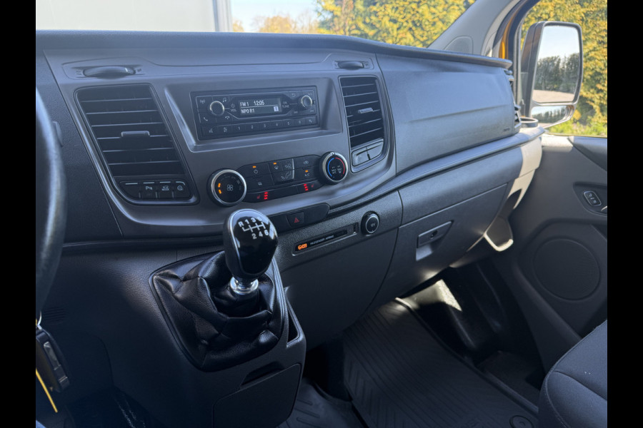 Ford Transit Custom 2.0 TDCI / L2H1 / 1e EIG. / AIRCO / CRUISE / 2.8 TONS TREKHAAK / STOELVERW / PDC / DAKDRAGERS