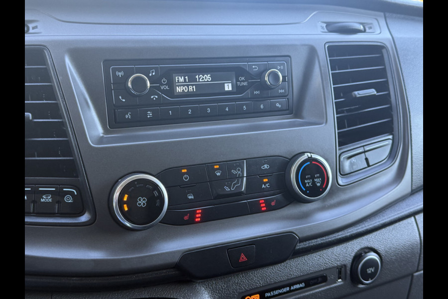 Ford Transit Custom 2.0 TDCI / L2H1 / 1e EIG. / AIRCO / CRUISE / 2.8 TONS TREKHAAK / STOELVERW / PDC / DAKDRAGERS