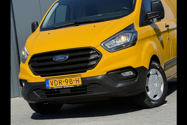 Ford Transit Custom 2.0 TDCI / L2H1 / 1e EIG. / AIRCO / CRUISE / 2.8 TONS TREKHAAK / STOELVERW / PDC / DAKDRAGERS