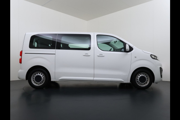 Opel Vivaro E L2H1 9-Persoons SOH 99% 50kWh Trekhaak Navi Airco Apple Carplay Android Auto Pdc Cruise Control Led Schuifdeur Isofix Bluetooth Dealeronderhouden 1e Eigenaar Origineel Nederlandse Bus