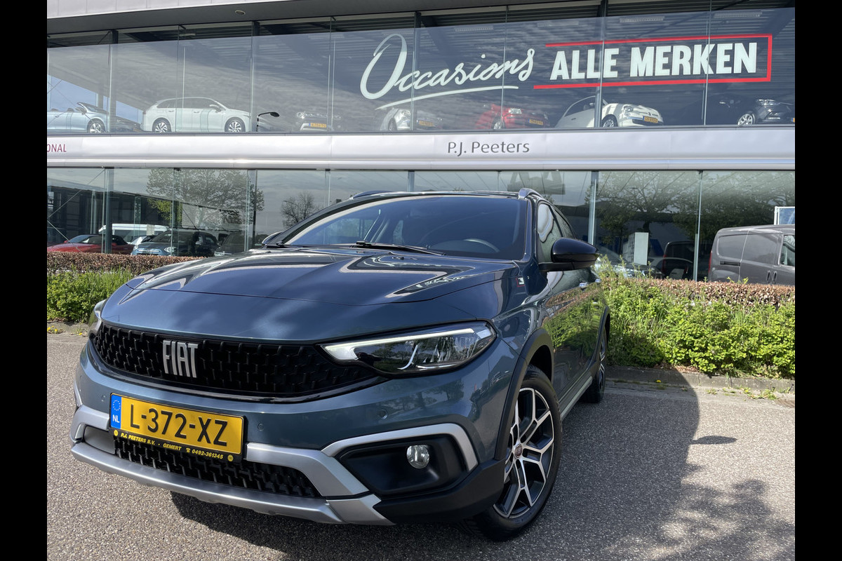 Fiat Tipo Cross 1.0 Cross Airco - Achteruitrijcamera - Parkeersensoren - Navigatie - Stoelverwarming - U-connect - Licht metalen velgen 17 inch - Trekhaak afneembaar - Cruise control - Radio - Mistlampen - Bluetooth - Dakrails - Elektrische ramen - Extra getint glas achter - Led verlichting - Start/stop systeem - Nieuw bij ons geleverd