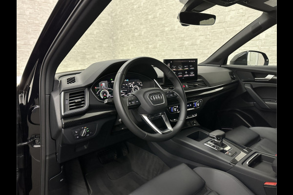 Audi Q5 50 TFSI e 300PK | Luchtvering | B&O Sound | Leder | Carbon | Sportstoelen | Carplay | Zwarte Hemel | Standkachel | Stoelverwarming | 3-Zone Clima | Black-Optic | Zonwering | Virtual Cockpit | LED | Autom. Achterklep | Bovag Garantie |
