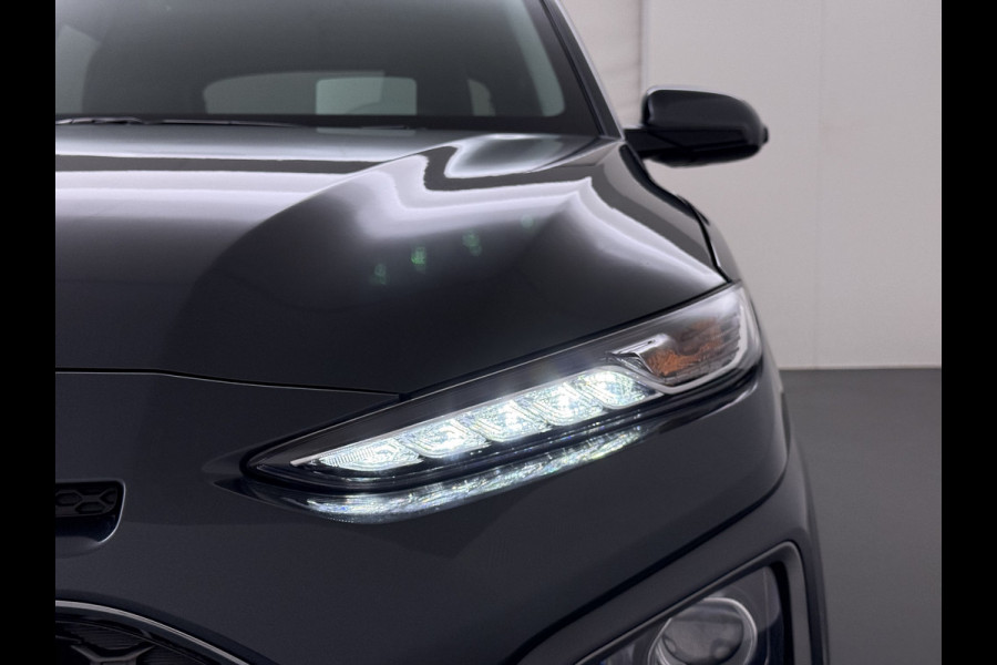 Hyundai Kona 1.6GDI HEV Hybride Premium Adap.Cruise Leder+Verwarming+Ventilatie Head-Up Display Camera Apple Carplay Android Auto Navi Ecc Pd Keyless Blind-Spot Lane Assist Achterbank+Stuur verwarming Krell®-Audio Isofix DAB Lmv 18" Origineel Nederlandse Auto