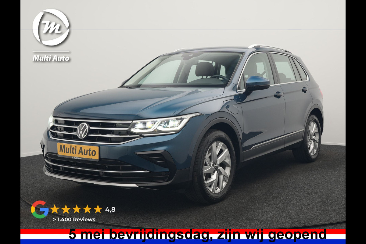 Volkswagen Tiguan 1.4 TSI eHybrid Elegance PHEV 245pk Dealer O.H. | Trekhaak Af Fabriek | Adaptive Cruise | IQ Light | Camera | Lederen Comfortzetels Memory & Verwarmd | Sfeerverlichting | Apple Carplay | Stuur Verwarmd | Navigatie | DAB | Plug In Hybrid |