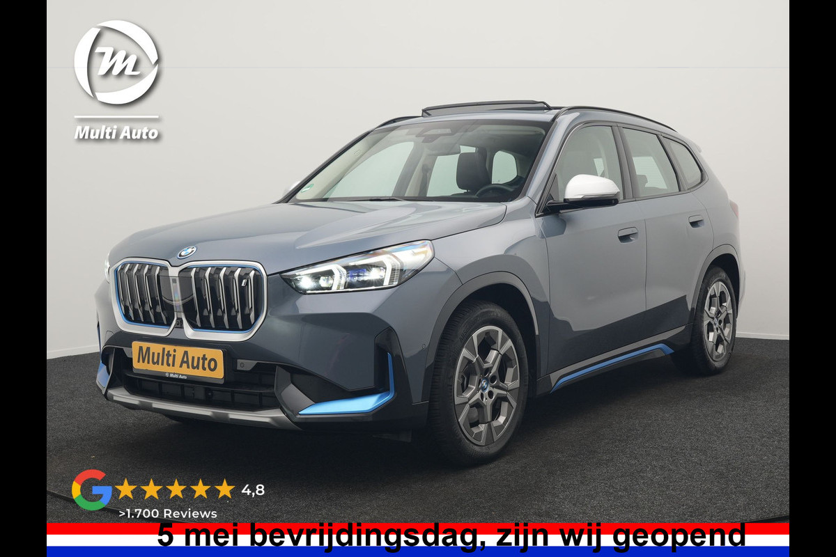BMW iX1 xDrive30 Launch Edition 313pk Dealer O.H 96.5% SOH | Panodak | Adaptive Cruise | 360 Camera | Lederen Comfortzetels Massage & Memory | Head Up | Harman Kardon | Keyless |