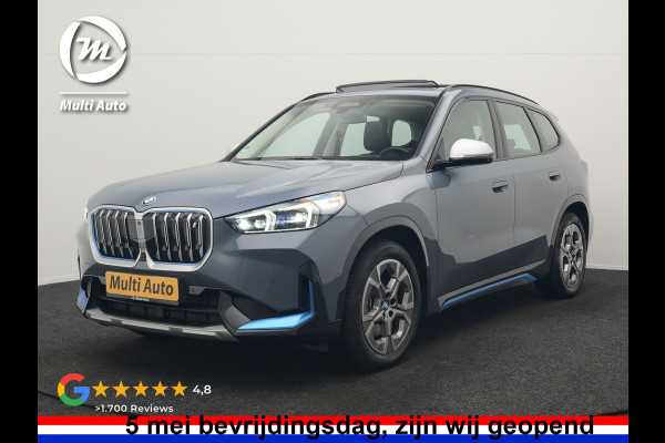BMW iX1 xDrive30 Launch Edition 313pk Dealer O.H 96.5% SOH | Panodak | Adaptive Cruise | 360 Camera | Lederen Comfortzetels Massage & Memory | Head Up | Harman Kardon | Keyless |