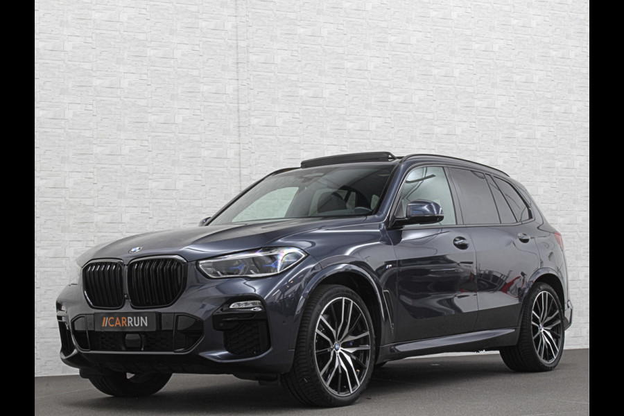 BMW X5 xDrive40i M-Sport | Panorama | 360 Camera | ACC | Laser-LED | Head-Up | Harman-Kardon | Trekhaak | Keyless-Entry | 22 inch | Memory | Leder | Carplay | Dealer Onderhouden | ISO-Glas | Sfeerverlichting | Draadloos Laden |