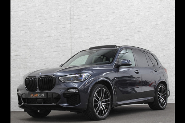 BMW X5 xDrive40i M-Sport | Panorama | 360 Camera | ACC | Laser-LED | Head-Up | Harman-Kardon | Trekhaak | Keyless-Entry | 22 inch | Memory | Leder | Carplay | Dealer Onderhouden | ISO-Glas | Sfeerverlichting | Draadloos Laden |