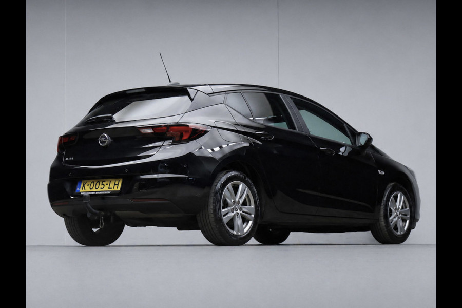Opel Astra 1.2 Edition Sport (APPLE CARPLAY,NAVI,CAMERA,PDC,CRUISE,GETINT,TREKHAAK,SPORTSTOELEN,LM VELGEN,NETTE STAAT)