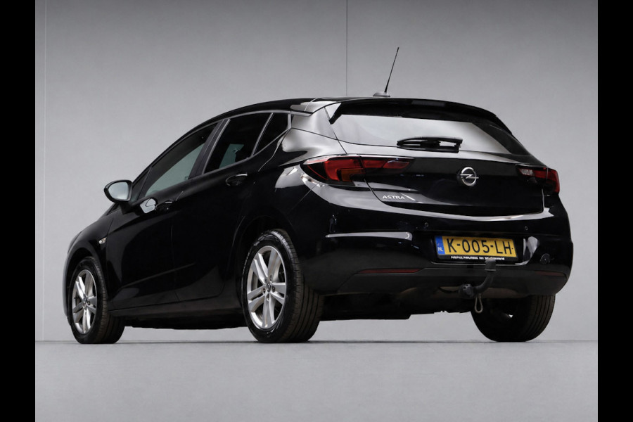 Opel Astra 1.2 Edition Sport (APPLE CARPLAY,NAVI,CAMERA,PDC,CRUISE,GETINT,TREKHAAK,SPORTSTOELEN,LM VELGEN,NETTE STAAT)