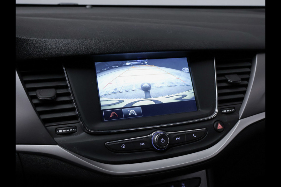 Opel Astra 1.2 Edition Sport (APPLE CARPLAY,NAVI,CAMERA,PDC,CRUISE,GETINT,TREKHAAK,SPORTSTOELEN,LM VELGEN,NETTE STAAT)