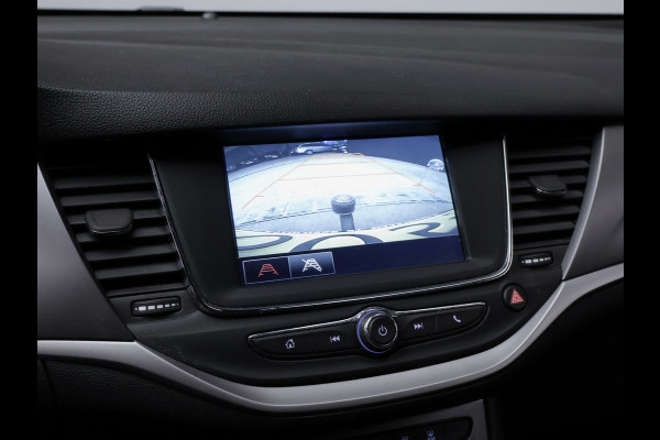 Opel Astra 1.2 Edition Sport (APPLE CARPLAY,NAVI,CAMERA,PDC,CRUISE,GETINT,TREKHAAK,SPORTSTOELEN,LM VELGEN,NETTE STAAT)