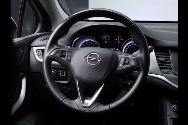 Opel Astra 1.2 Edition Sport (APPLE CARPLAY,NAVI,CAMERA,PDC,CRUISE,GETINT,TREKHAAK,SPORTSTOELEN,LM VELGEN,NETTE STAAT)