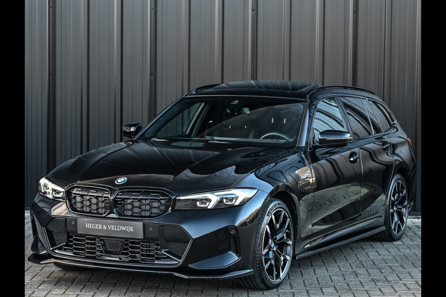 BMW 3 Serie Touring 330e xDrive M sport | Accu 19,5kWh | Trekhaak | Panorama dak  | Active Cruise | Camera  | Ambiance interieur