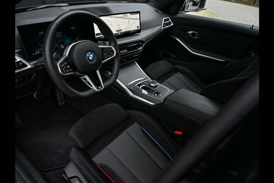 BMW 3 Serie Touring 330e xDrive M sport | Accu 19,5kWh | Trekhaak | Panorama dak  | Active Cruise | Camera  | Ambiance interieur