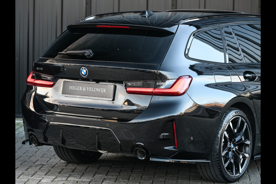 BMW 3 Serie Touring 330e xDrive M sport | Accu 19,5kWh | Trekhaak | Panorama dak  | Active Cruise | Camera  | Ambiance interieur
