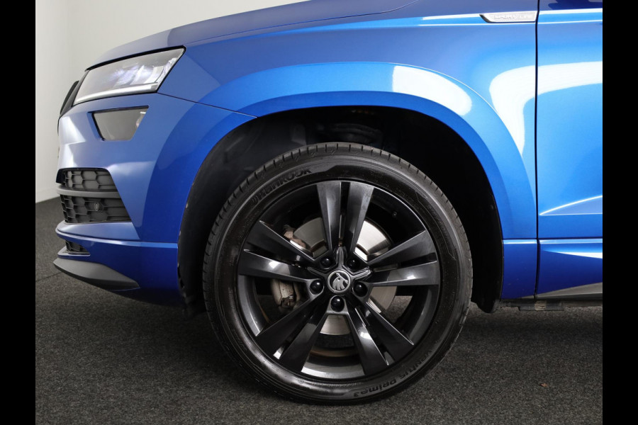 Škoda Karoq 1.5 TSI ACT Sportline Business 150pk | Wegklapbare trekhaak | Navigatie | Parkeercamera | Led koplampen