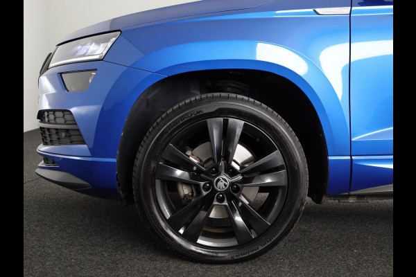 Škoda Karoq 1.5 TSI ACT Sportline Business 150pk | Wegklapbare trekhaak | Navigatie | Parkeercamera | Led koplampen