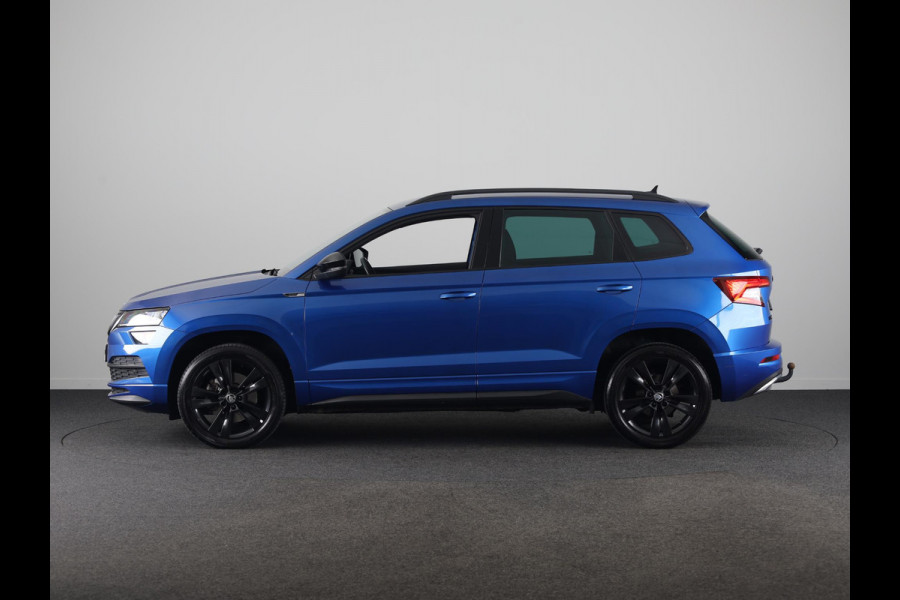 Škoda Karoq 1.5 TSI ACT Sportline Business 150pk | Wegklapbare trekhaak | Navigatie | Parkeercamera | Led koplampen