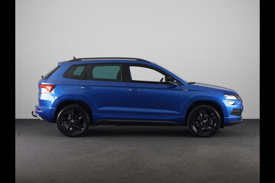 Škoda Karoq 1.5 TSI ACT Sportline Business 150pk | Wegklapbare trekhaak | Navigatie | Parkeercamera | Led koplampen