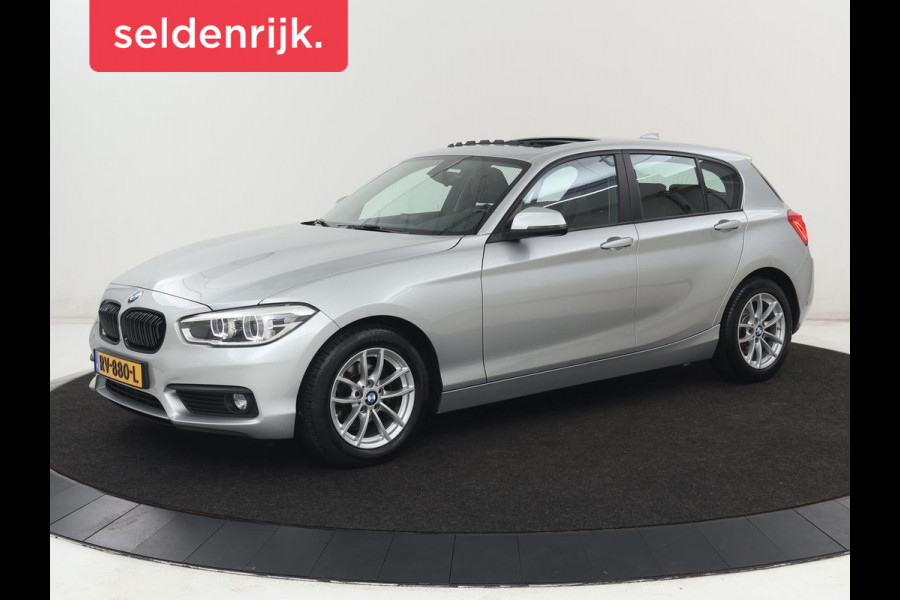 BMW 1-serie 118i Executive | Schuifdak | Leder | Stoelverwarming | Camera | Full LED | Navigatie | Parkeerhulp | Climate control | Bluetooth | Cruise control