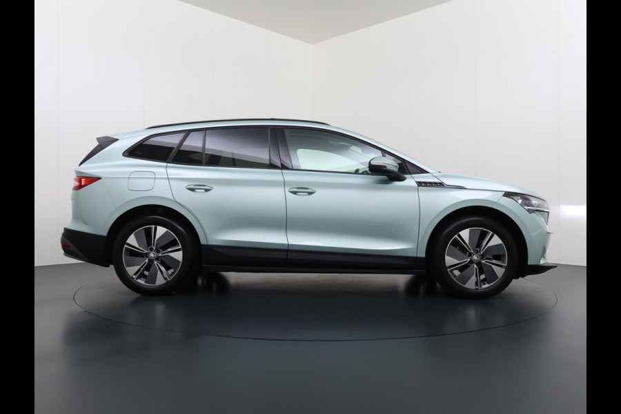 Škoda ENYAQ iV 60 Panoramadak Warmtepomp Trekhaak SOH 93% Elek.Stoel+Memory Navi 3-Zone Ecc 360°Camera Adap.Cruise Apple Carplay Android Auto Stoel+Stuurverwarming Lmv P Assist Keyless advanced Led Matrix Klimaat Plus Origineel Nederlandse Auto 1.000KG Trekgewicht