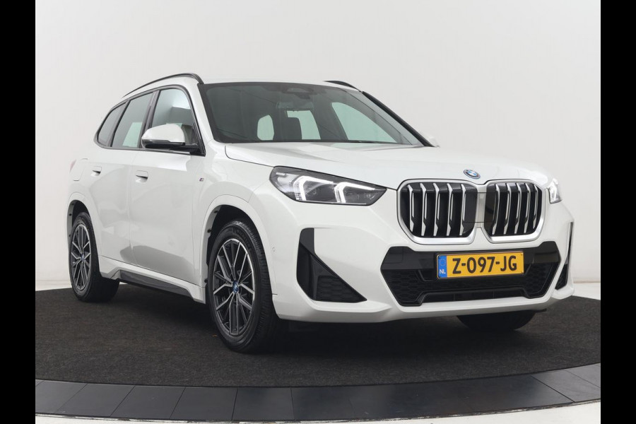 BMW X1 xDrive25e M Sport | SOH 93,3% | Adaptive cruise | Massage | Sportstoelen | Keyless | Stuurverwarming | Leder/Alcantara | Live Cockpit | Camera | Stoelverwarming | Adaptief LED | PHEV | Plug In