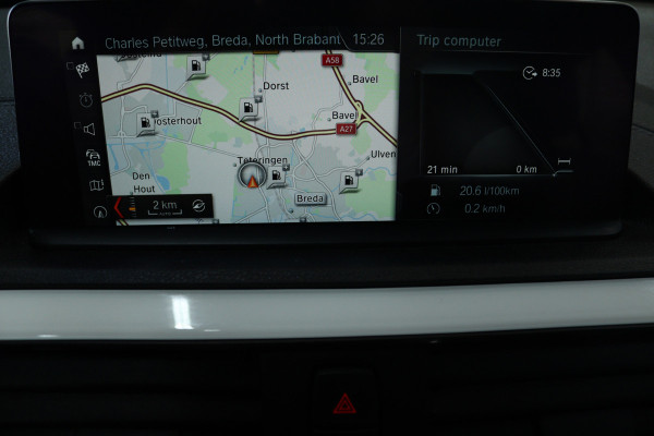 BMW 1-serie 118i Executive (STOELVERWARMING, CAMERA, NAVIGATIE, CRUISE CONTROL, PARKEERSENSOREN, DEALER ONDERHOUDEN)