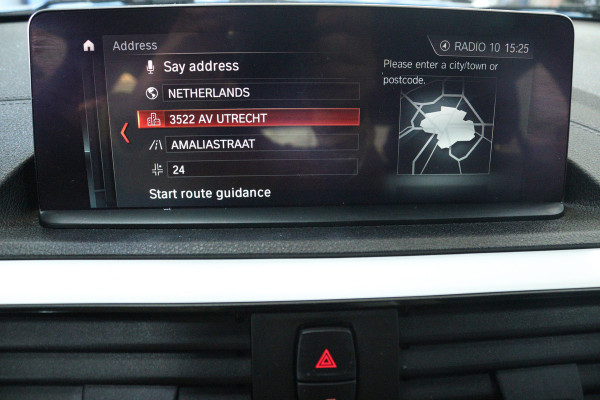 BMW 1-serie 118i Executive (STOELVERWARMING, CAMERA, NAVIGATIE, CRUISE CONTROL, PARKEERSENSOREN, DEALER ONDERHOUDEN)