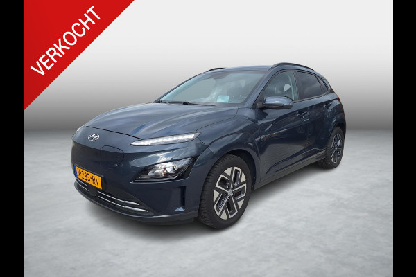 Hyundai Kona EV Fashion 64 kWh | SOH: 94,5% | 3 Fase | Warmtepomp | Blindspot | Navi | Camera |