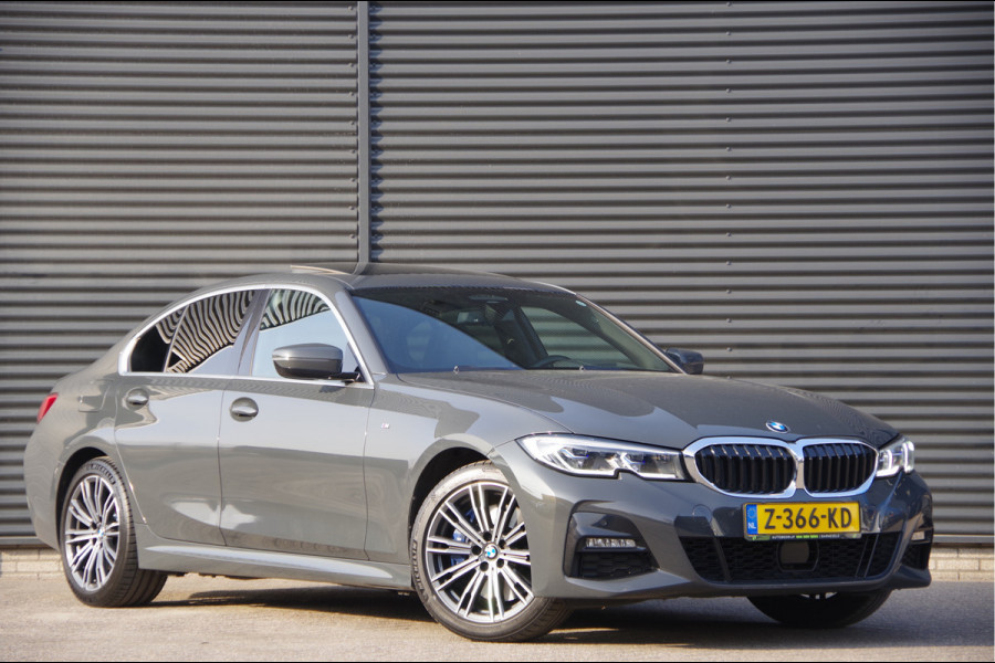 BMW 3-serie 330e M-SPORT SCHUIFDAK, INDIVIDUAL LEDER, LASER, HUD, HARMAN/KARDON, ADAPT. CRUISE, SPORTSTOELEN, DRAVIT GRAU