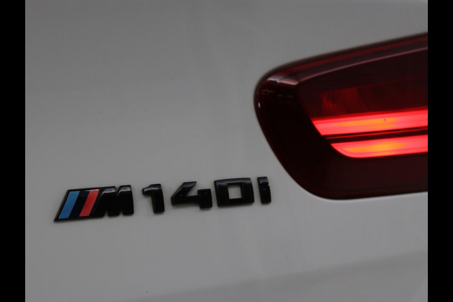 BMW 1-serie M140i High Executive | Stoelverwarming | Carplay | Leder | Adaptief LED | Keyless | Navigatie | Sportstoelen | Parkeerhulp | Climate control | Cruise control | Bluetooth | Getint glas | M Sport