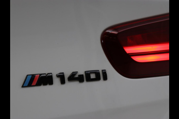 BMW 1-serie M140i High Executive | Stoelverwarming | Carplay | Leder | Adaptief LED | Keyless | Navigatie | Sportstoelen | Parkeerhulp | Climate control | Cruise control | Bluetooth | Getint glas | M Sport
