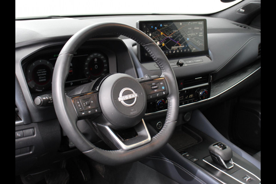 Nissan QASHQAI 1.3 MHEV Xtronic Tekna Plus Automaat Navigatie Apple Carplay/Android Auto Parkeersensoren 360 camera Adaptive cruise control Panoramadak Elektrische achterklep Elektrische bestuurderstoel Stoel-en stuurverwarming Ledverlichting Climate Control