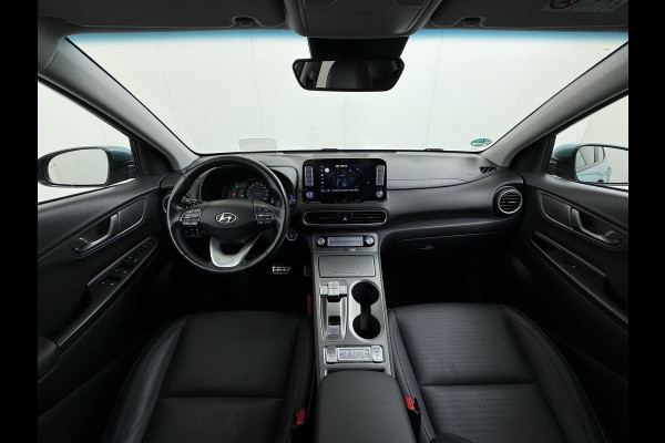 Hyundai Kona EV 64kWh 204pk Premium Warmtepomp Leer Head-Up Display Apple Carplay Android Navi Camera Elektr.Stoelen+Verwarmd+Ventilatie Adap Verwarmd Stuur Pdc Subwoofer Bluetooth Dodehoek detector Privacy Glas Rijstrooksensor Origineel Nederlandse EV