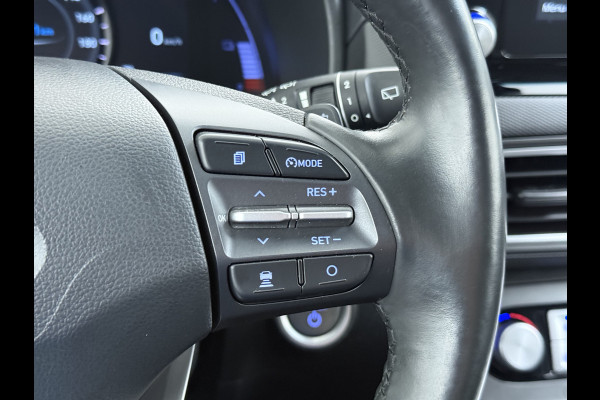 Hyundai Kona EV 64kWh 204pk Premium Warmtepomp Leer Head-Up Display Apple Carplay Android Navi Camera Elektr.Stoelen+Verwarmd+Ventilatie Adap Verwarmd Stuur Pdc Subwoofer Bluetooth Dodehoek detector Privacy Glas Rijstrooksensor Origineel Nederlandse EV