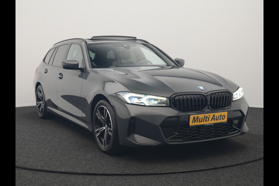 BMW 3 Serie Touring 330e M Sport FACELIFT PHEV 293pk Dealer O.H. | Trekhaak Af Fabriek | Panodak | Head Up | Camera | Dravitgrau | Lederen Sportstoelen Verwarmd | Sfeerverlichting | Apple Carplay | Keyless | Blis | Cruise Control | Navigatie | DAB | Plug In Hybrid |