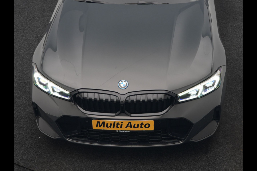 BMW 3 Serie Touring 330e M Sport FACELIFT PHEV 293pk Dealer O.H. | Trekhaak Af Fabriek | Panodak | Head Up | Camera | Dravitgrau | Lederen Sportstoelen Verwarmd | Sfeerverlichting | Apple Carplay | Keyless | Blis | Cruise Control | Navigatie | DAB | Plug In Hybrid |